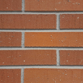 Orange red brick-slip finish